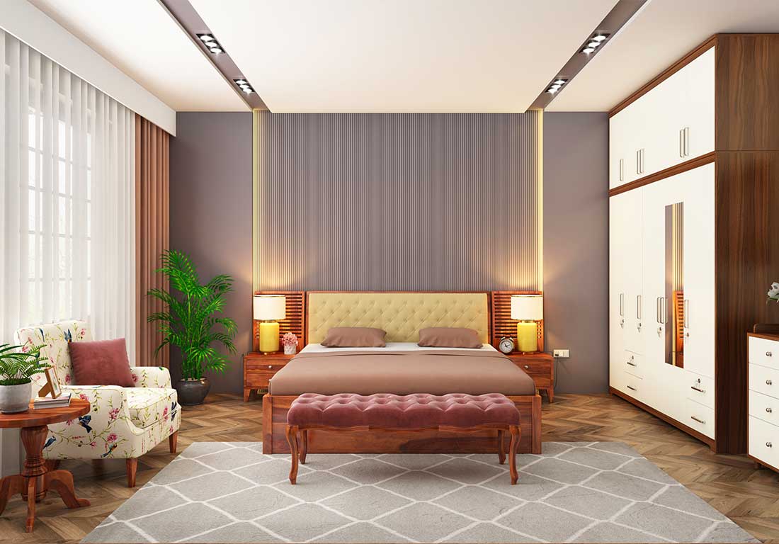 Schlafzimmer mit Polsterbett, Samtbank am Fußende, Holzschränken und indirekter Beleuchtung
